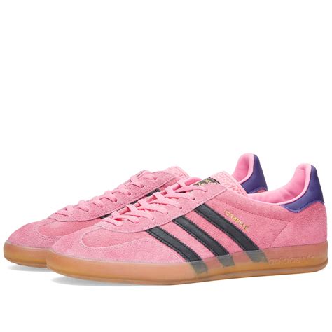 pink and black Adidas gazelle